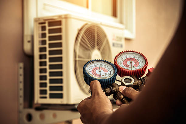 Professional Heat Pump Repair technician working in Arcadia, LA
